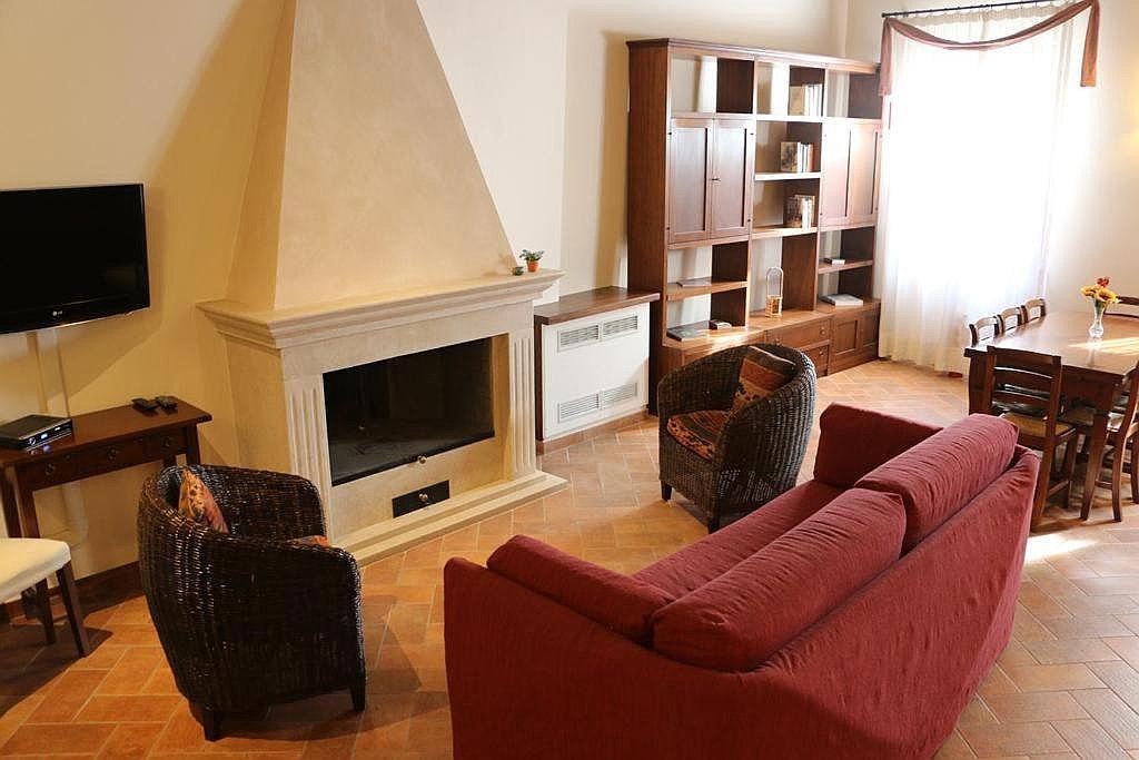 living room large dining table fireplace TV seating area