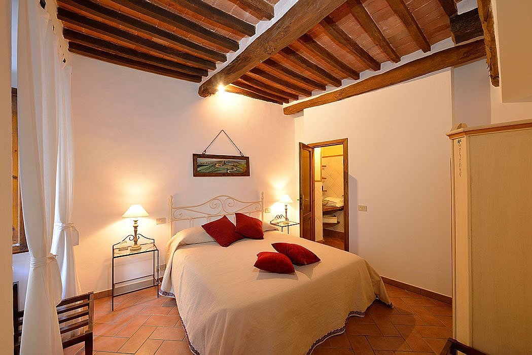 bedroom large wide double spacious bright white rustic traditional Tuscan wood double bed ensuite